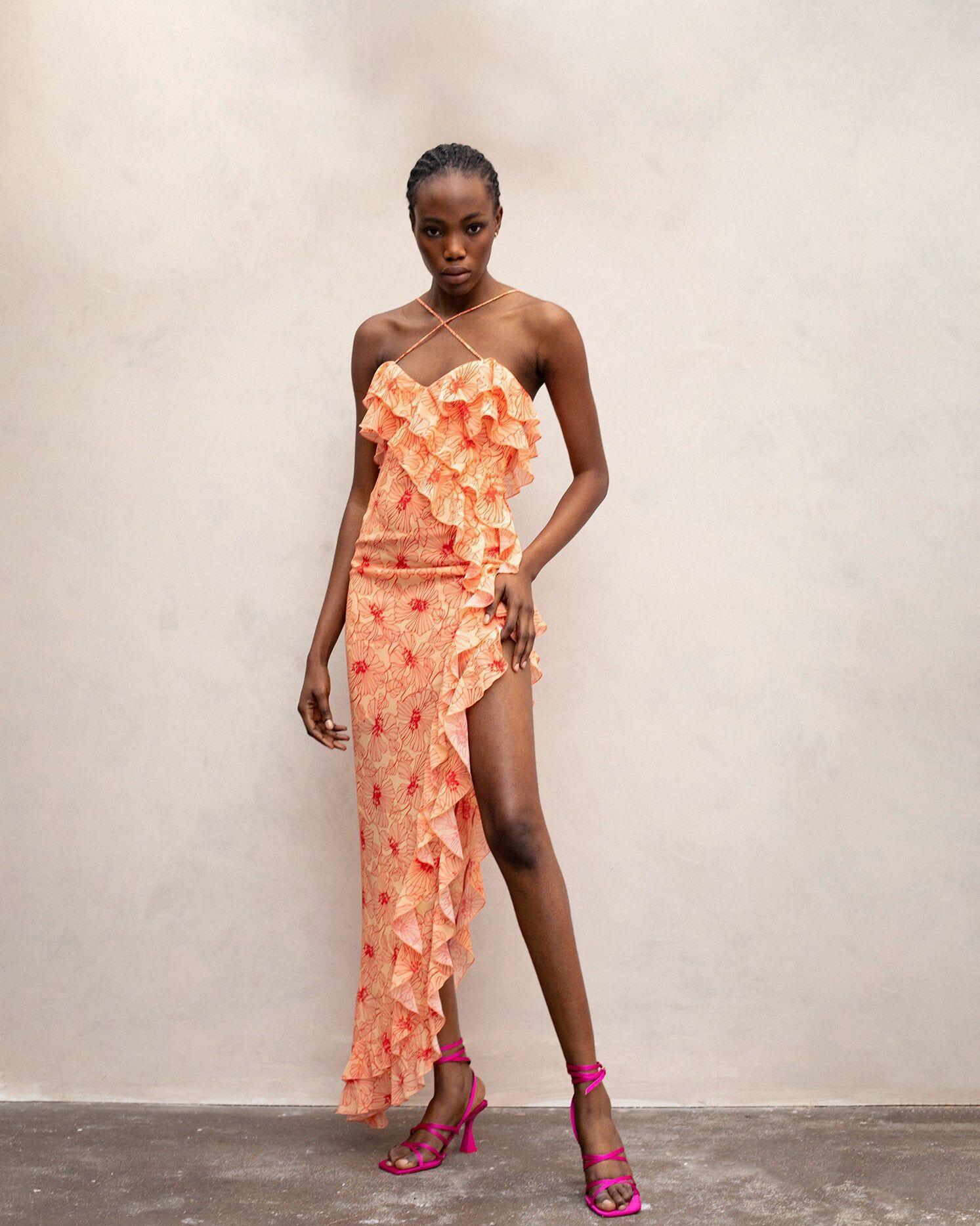 Vestito midi romantico con volant floreale e spacco