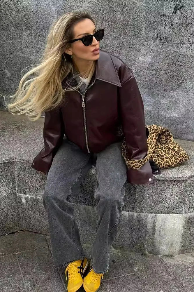 Giacca da motociclista elegante in pelle con rever