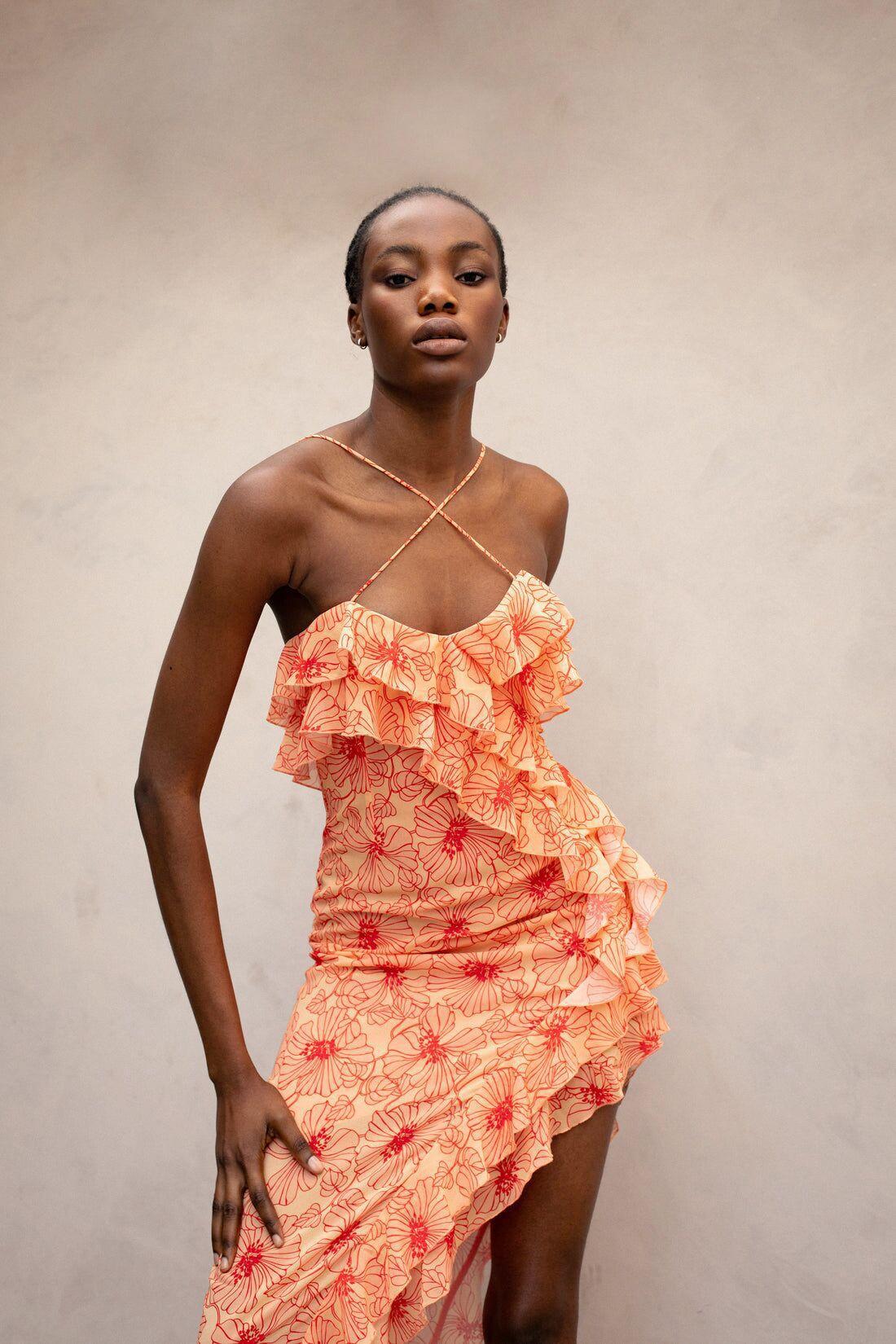 Vestito midi romantico con volant floreale e spacco