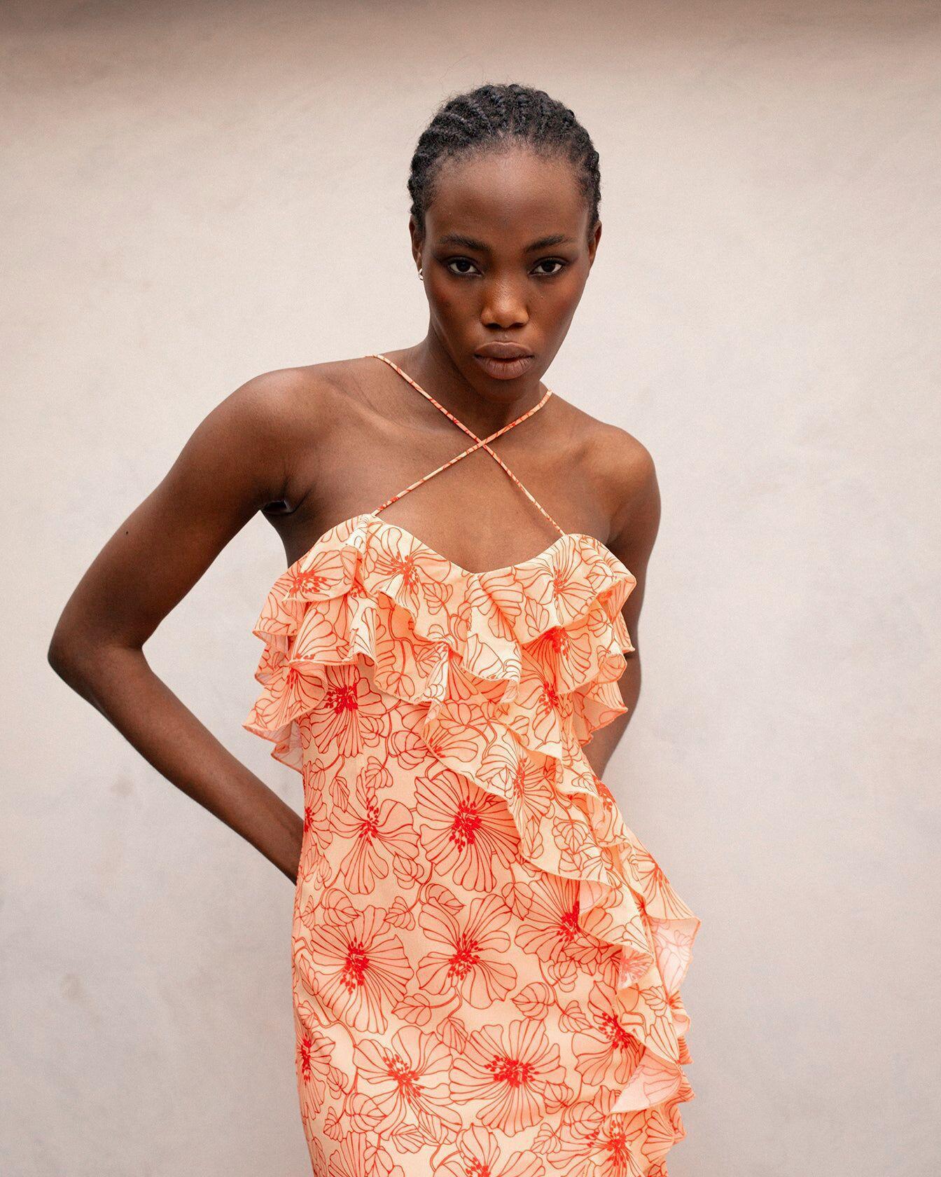 Vestito midi romantico con volant floreale e spacco