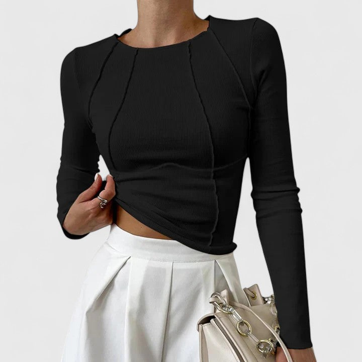 Top elegante con maniche lunghe