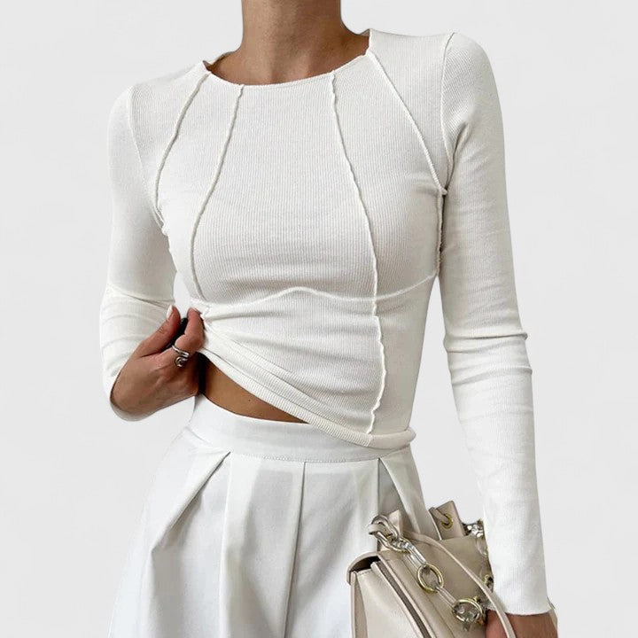 Top elegante con maniche lunghe