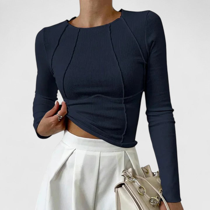 Top elegante con maniche lunghe