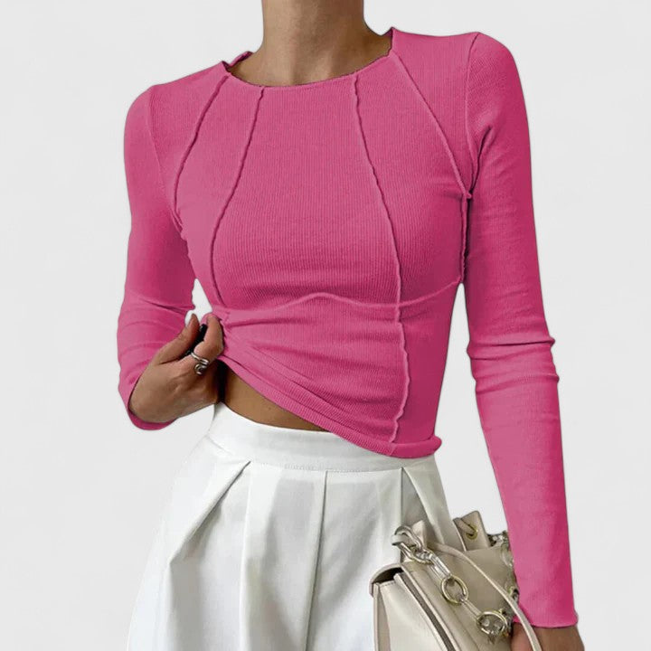 Top elegante con maniche lunghe