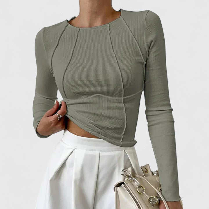 Top elegante con maniche lunghe