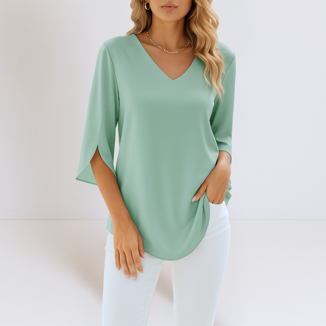 Blusa elegante con scollo a V e maniche con spacchi