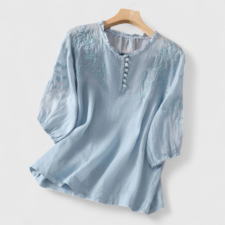 Camicetta in voile di cotone con spalle ricamate